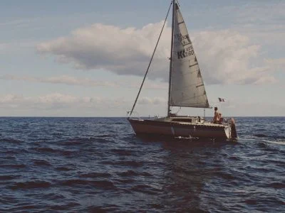 A sailing yacht under sail on open water